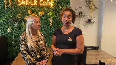Daisy and Gabi at Skil-Lit Cafe in Trenton Plating Some Great Food