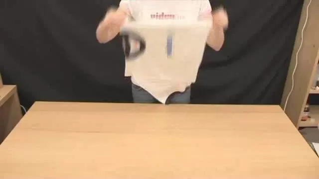 How To Fold A T-Shirt In 2 Seconds - Explained